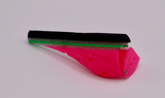 Fresh water fishing lure great for bass, trout, and walleye - featuring an open scent chamber in black, glittery clear, green, and pink -from the side