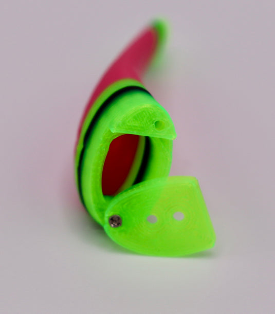 Fresh water fishing lure in green, pink, and black featuring an open cavity - from the front - great as salmon lures, bass lures, trout lures, and walleye fishing tackle.