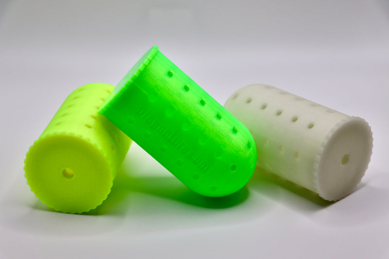 Load image into Gallery viewer, Three bait baskets designed for deep sea fishing, one in ultraviolet green and the other in glow-in-the-dark feature, both with multiple perforations along their length.
