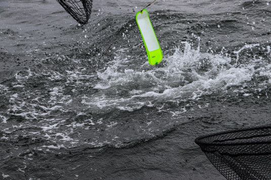 Salmon and fresh water fishing magnetic breakaway tool in action 