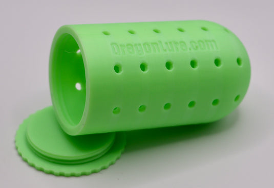 Deep Sea Fishing Lure for halibut and Lingcod in green glow with the bait basket open