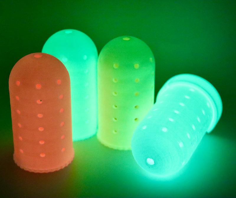 Load image into Gallery viewer, Deep Sea Fishing Lure for halibut and Lingcod with a group of the lures together glowing in the dark in pink, yellow, green and bright green
