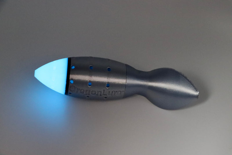 Load image into Gallery viewer, Salmon fishing lure in blue glow, blue-chrome, and black from the side - great for chinook salmon and coho salmon
