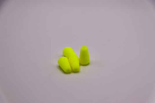 Fresh water lure tails in neon yellow - used as bass lure, trout lure, and walleye fishing tackle
